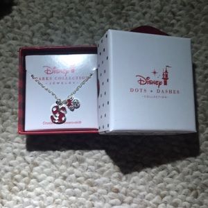 This is a Disney necklace that has never been worn or even taken out of the box.